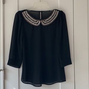 Black blouse with beaded collar